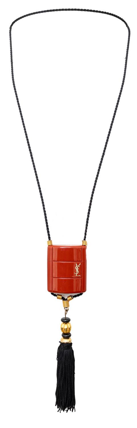 Yves Saint Laurent VINTAGE OPIUM PERFUME TASSLE NECKLACE DESCRIPTION: This...