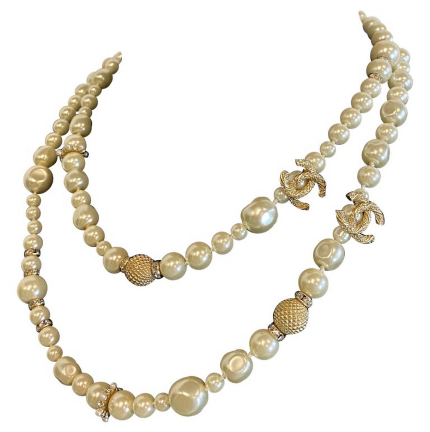 Chanel LONG NECKLACE DESCRIPTION: Chanel pearl necklace with rhinestones both...