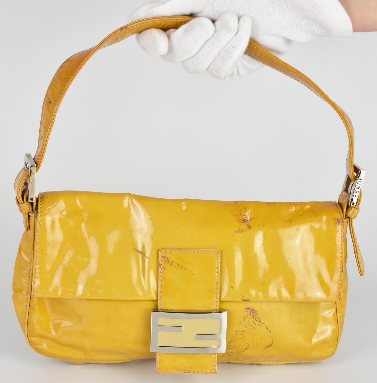 Fendi PATENT YELLOW BAGUETTE DESCRIPTION: Iconic yellow patent leather...