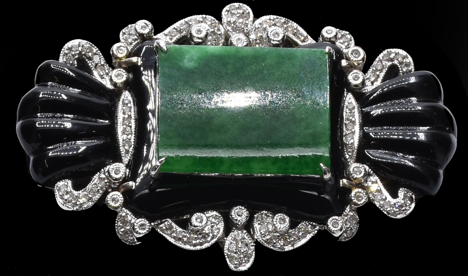 IMPORTANT BROOCH IN JADE, ENGRAVED ONYX, AND DIAMONDS DESCRIPTION: Elegant...