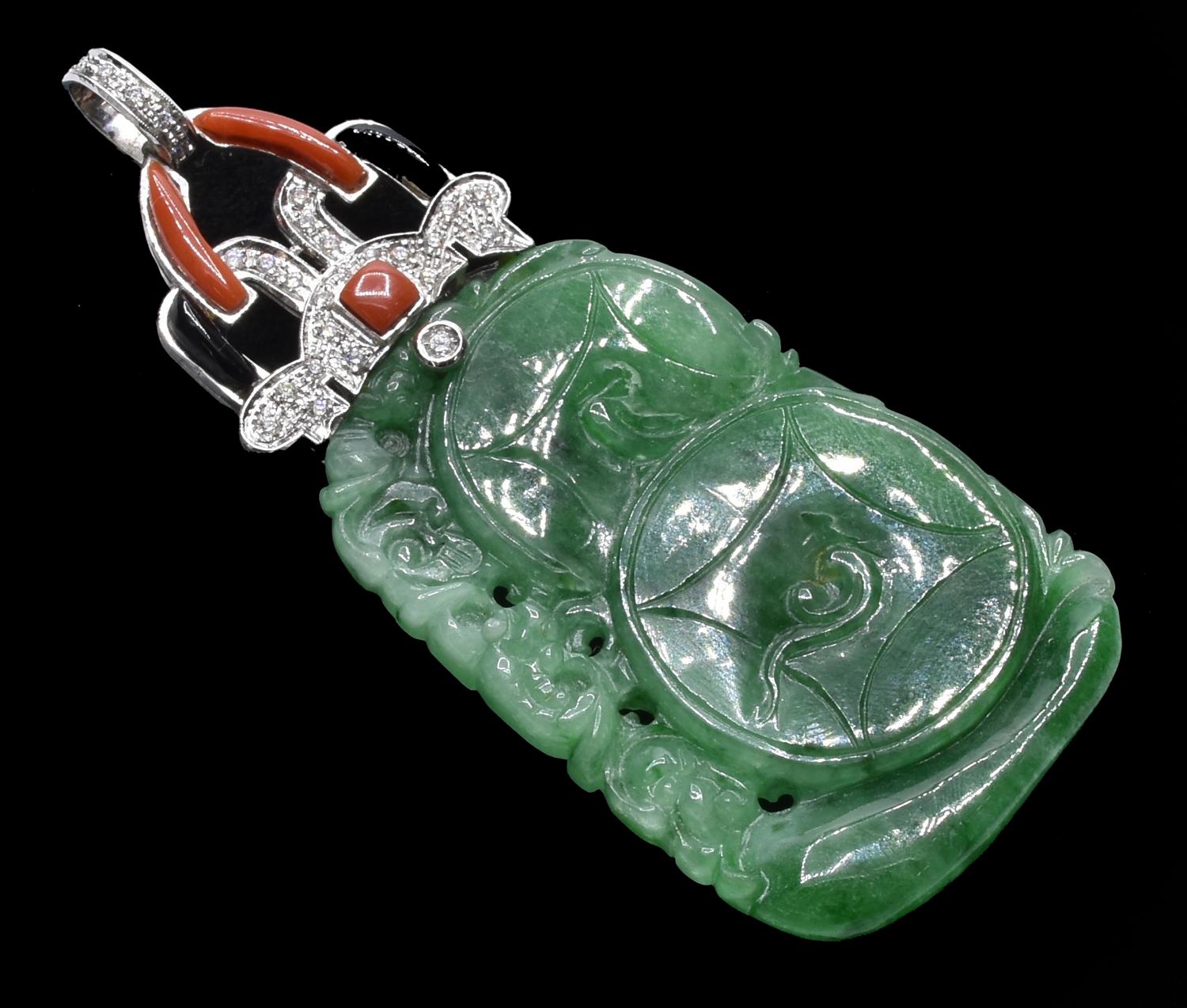 IMPORTANT ART DÉCO STYLE PENDANT IN ENGRAVED JADE, CORAL, AND ONYX...