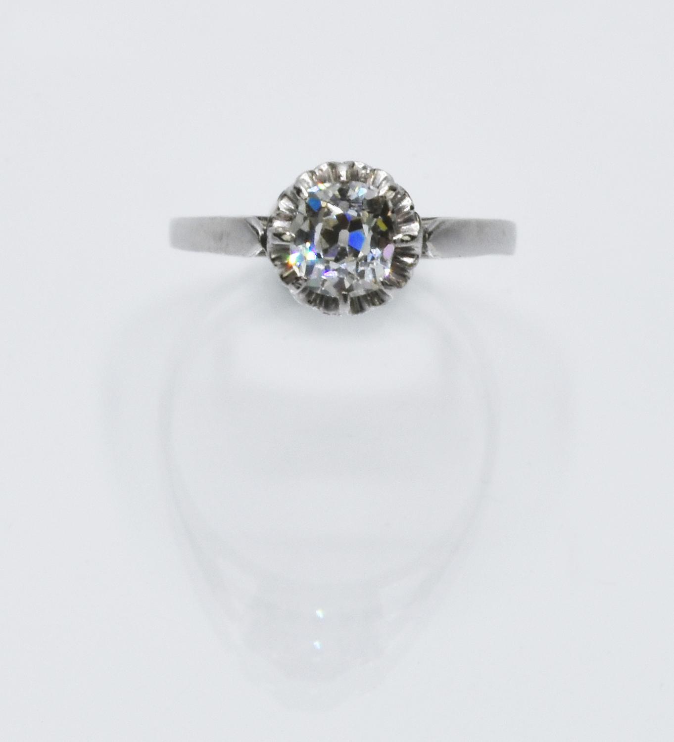 SOLITAIRE RING 18K white gold ring featuring a natural antique-cut diamond,...