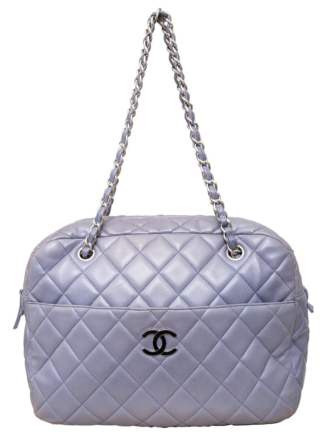 Chanel QUILTED LEATHER CAMERA BAG DESCRIPTION: The iconic Chanel Quilted...