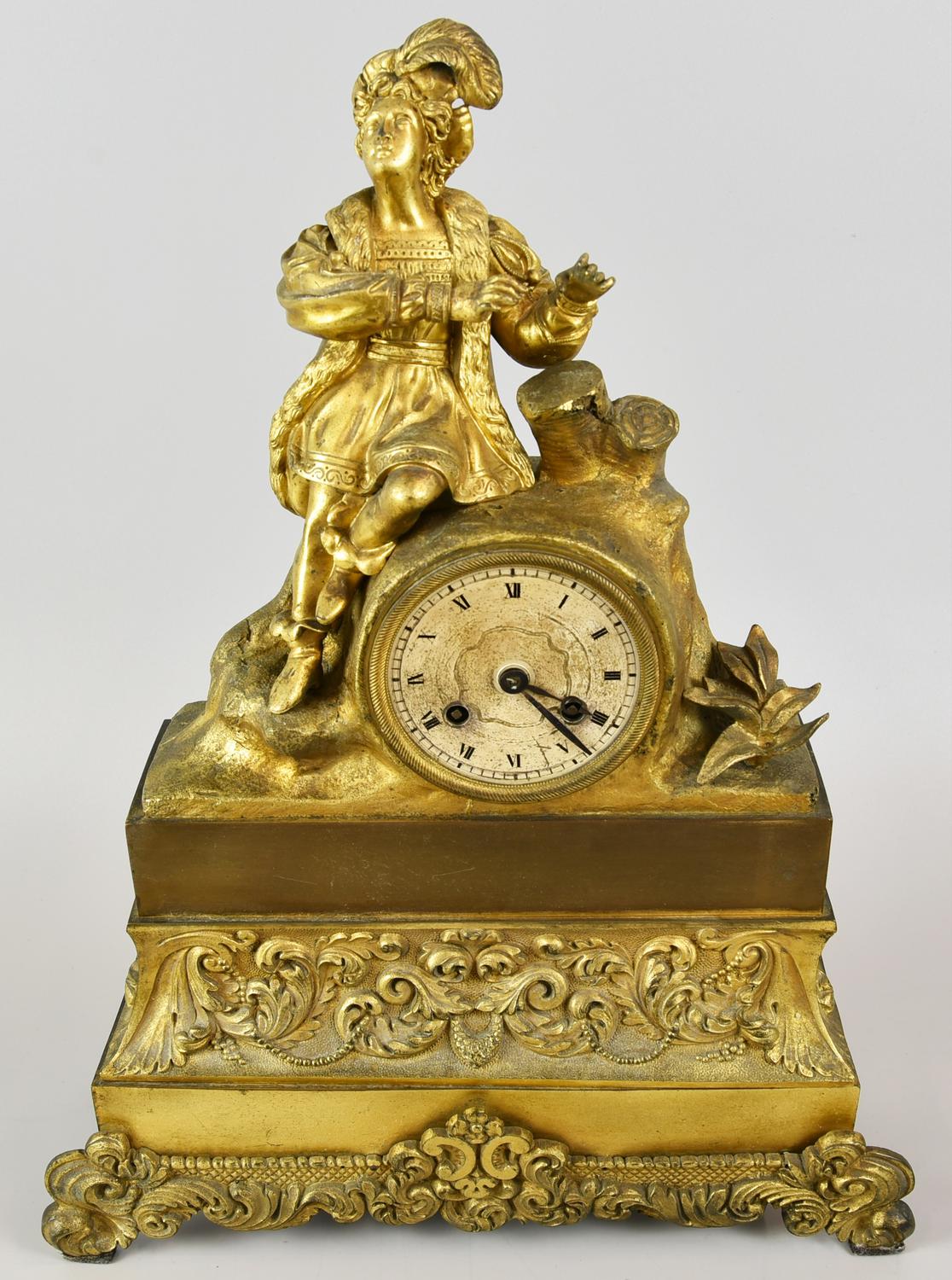 OROLOGIO DA TAVOLO IN BRONZO DORATO, Francia XIX secolo cassa superiore con...